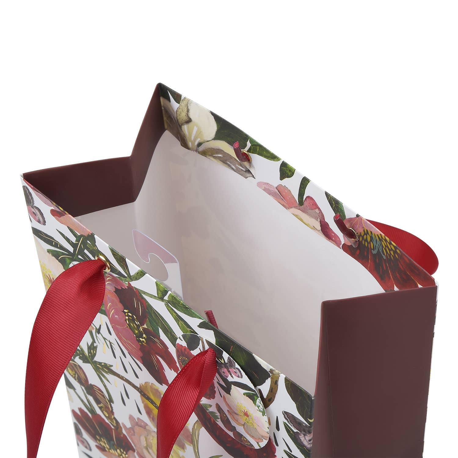 Gift bag with floral pattern and red ribbon 