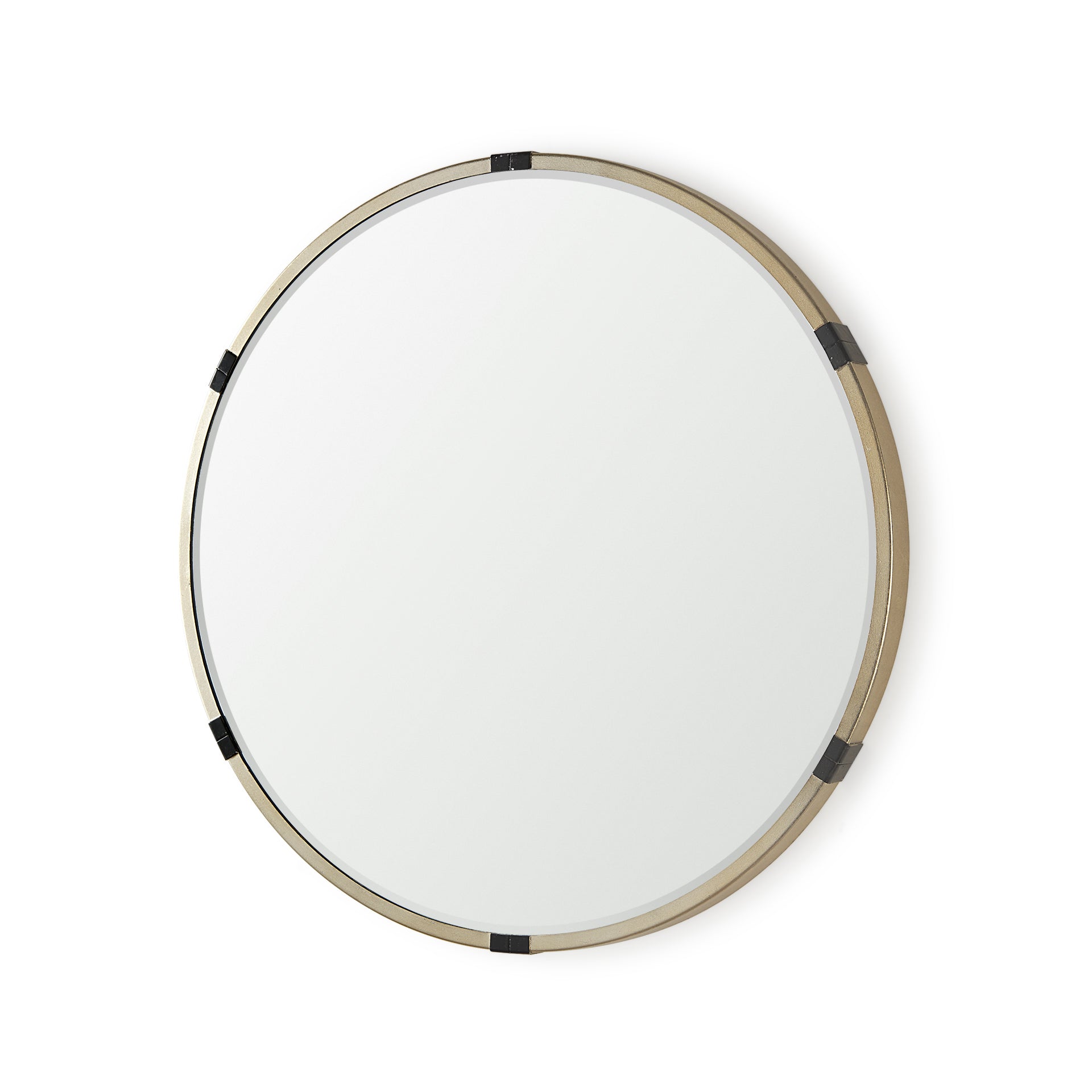 A round mirror with gold finish and black metal accent