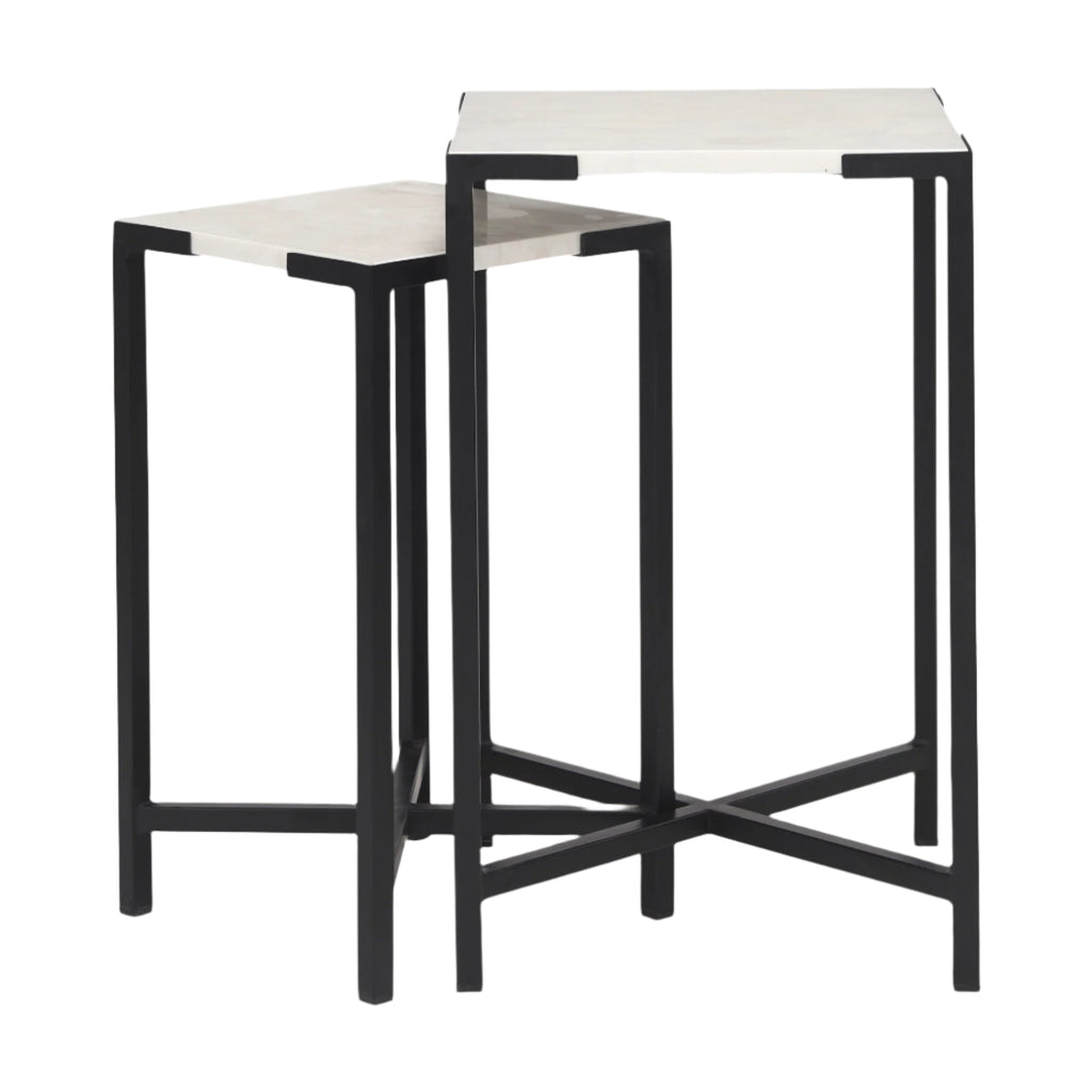 This set of nesting tables feature square, marble tops that rest neatly upon crisscross, iron frames.