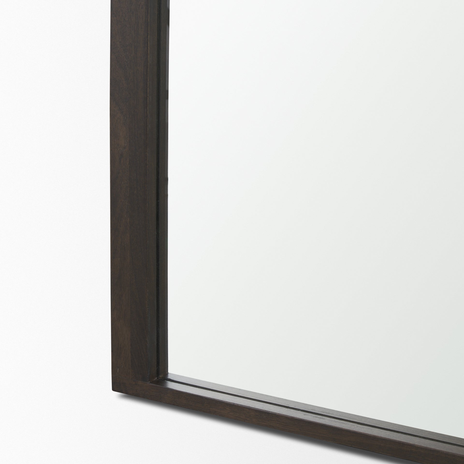 The full length arched Celeste Wall Mirror with solid mango wood frame has a smooth dark brown finish.