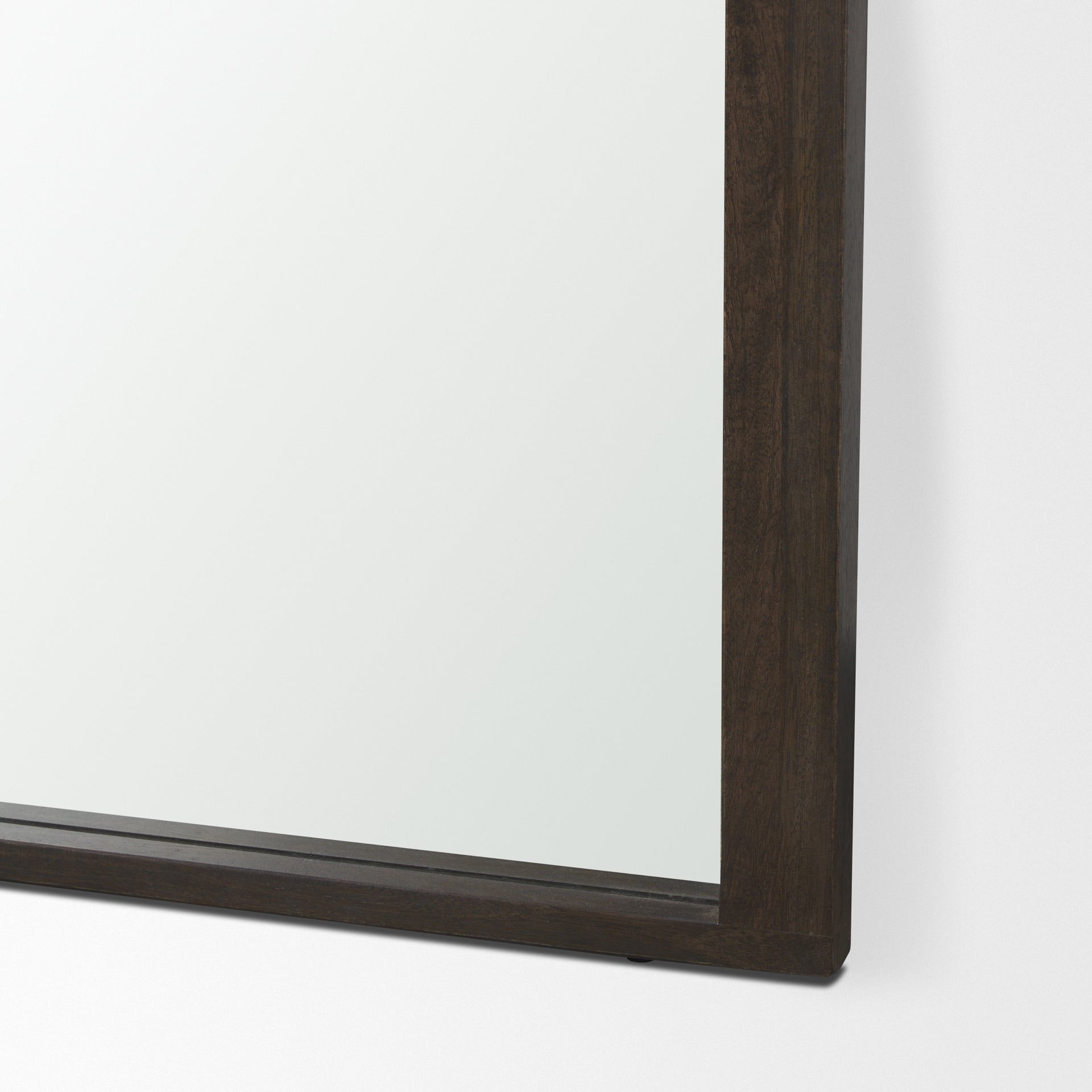 The full length arched Celeste Wall Mirror with solid mango wood frame has a smooth dark brown finish.