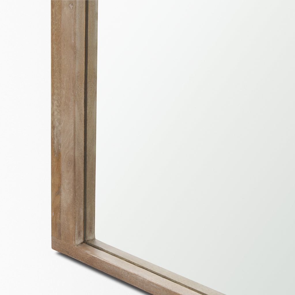 The full length Arched Celeste Mirror with solid mango wood frame has a smooth light brown finish.