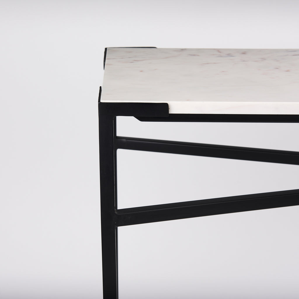 The Lucas is a simple yet stylish, metal console table featuring a stunning, white marble top.
