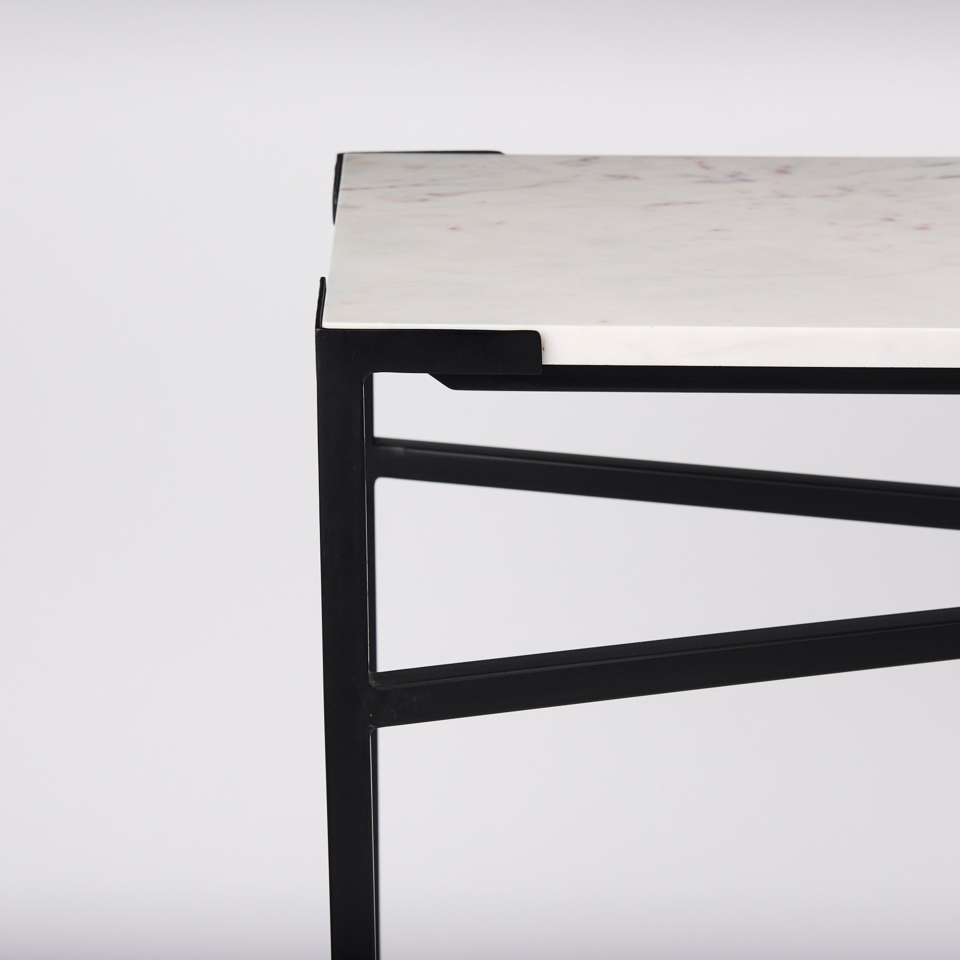 The Lucas is a simple yet stylish, metal console table featuring a stunning, white marble top.