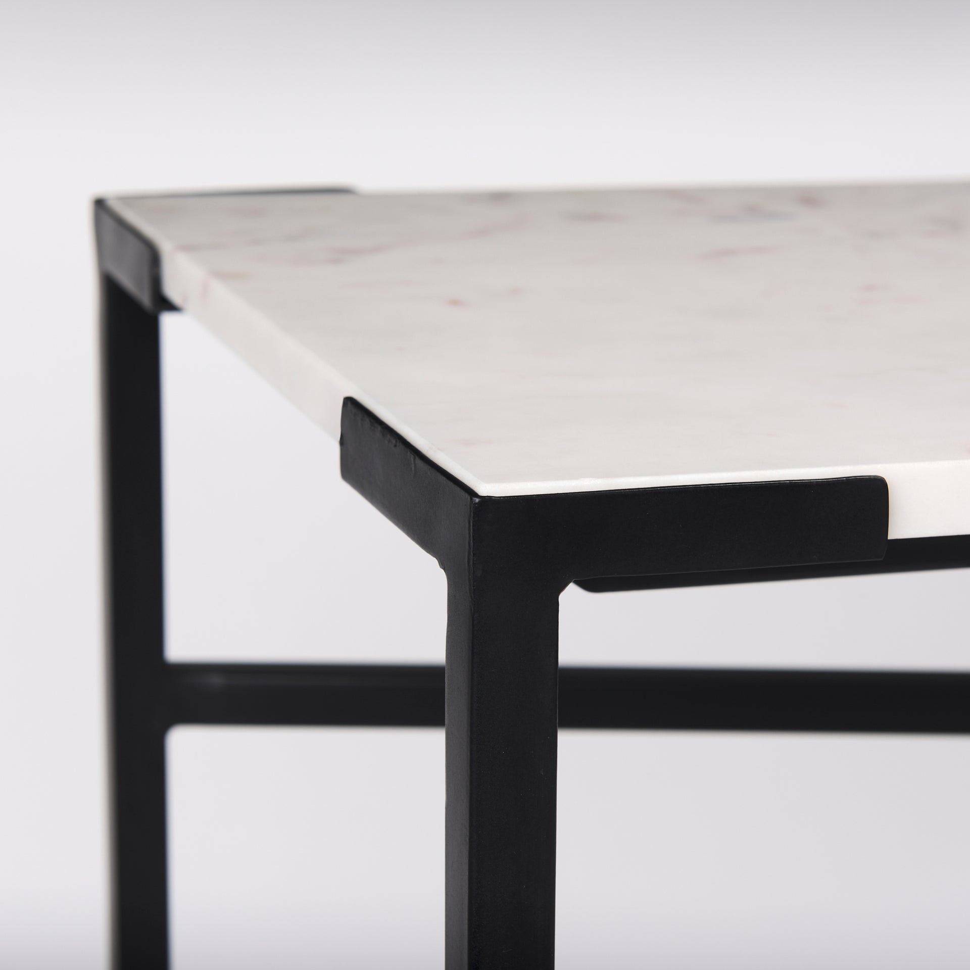 The Lucas is a simple yet stylish, metal console table featuring a stunning, white marble top.
