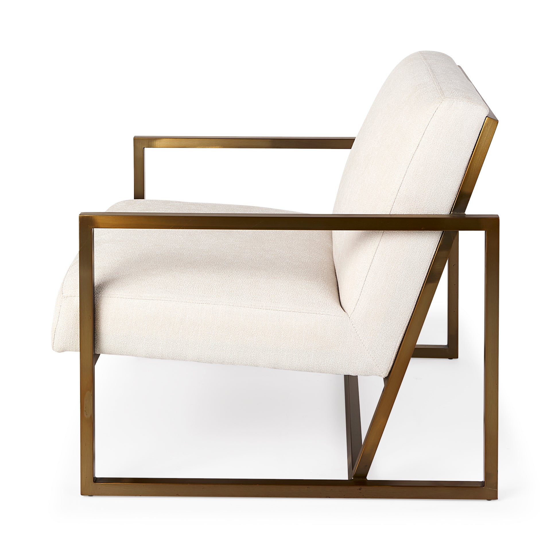 A metal and fabric accent chair oozing angular elegance.  Gold metal frame and cream fabric.
