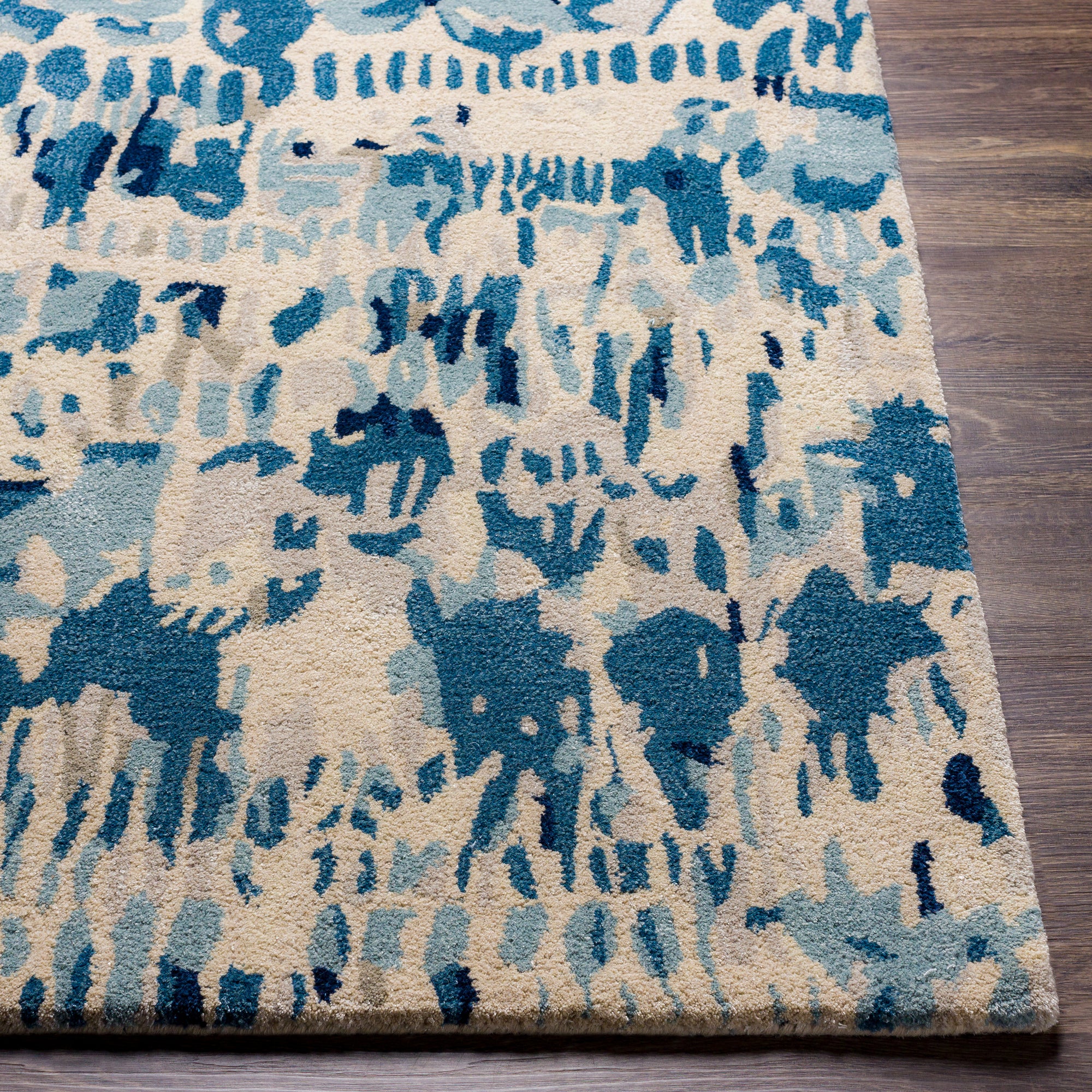 the kavita area rug, a wool and viscose blend, in a abstract pattern including colours Navy, Denim, Gray, Light Gray, Light Beige