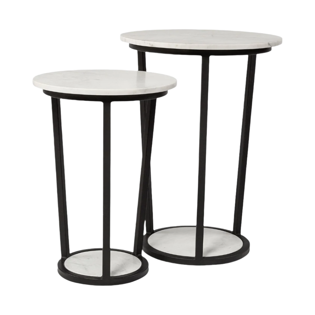 Two round side tables with white tops and black frames