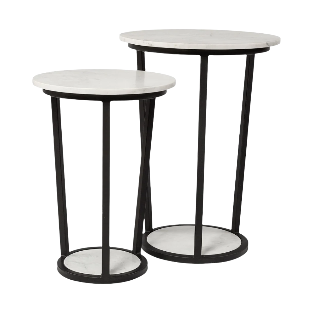 Two round side tables with white tops and black frames