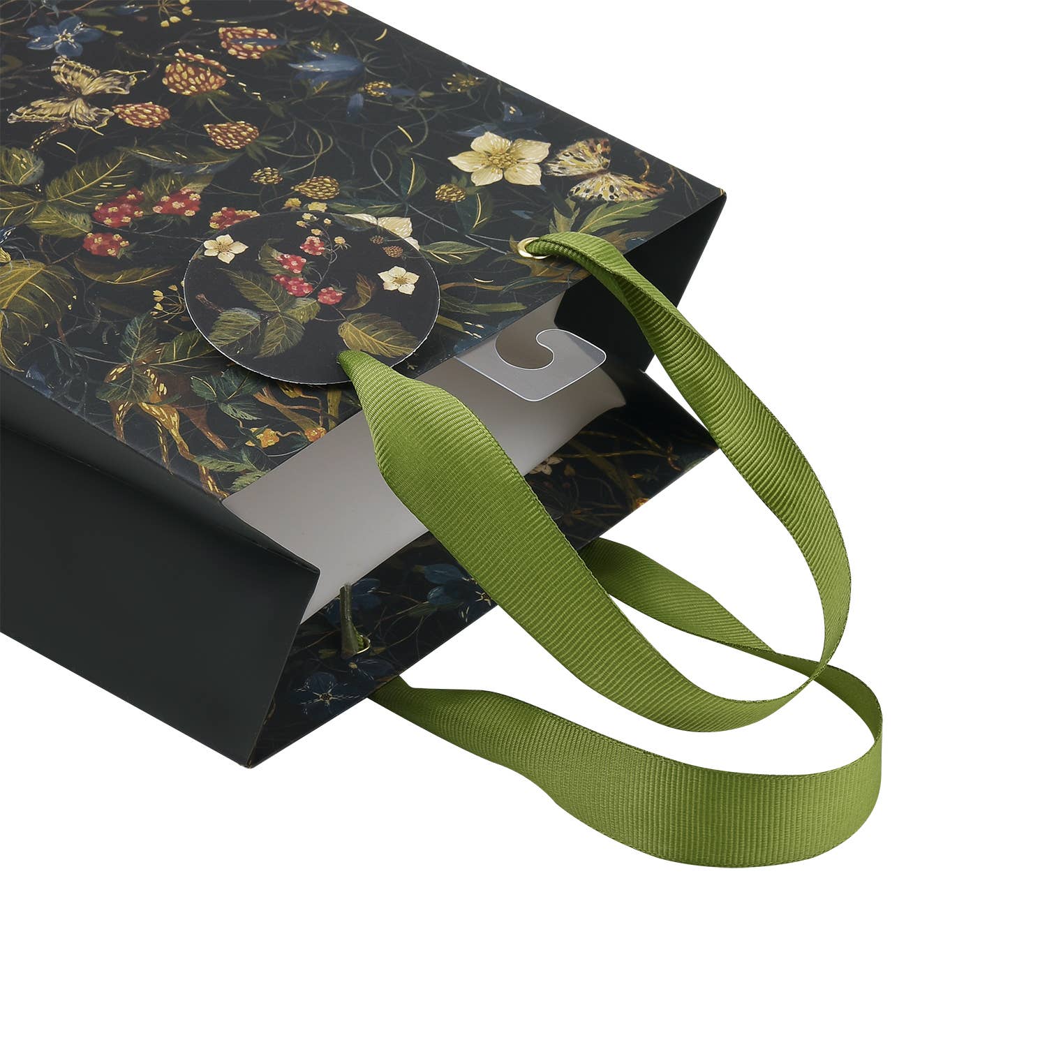 Gift bag with floral design and green ribbon