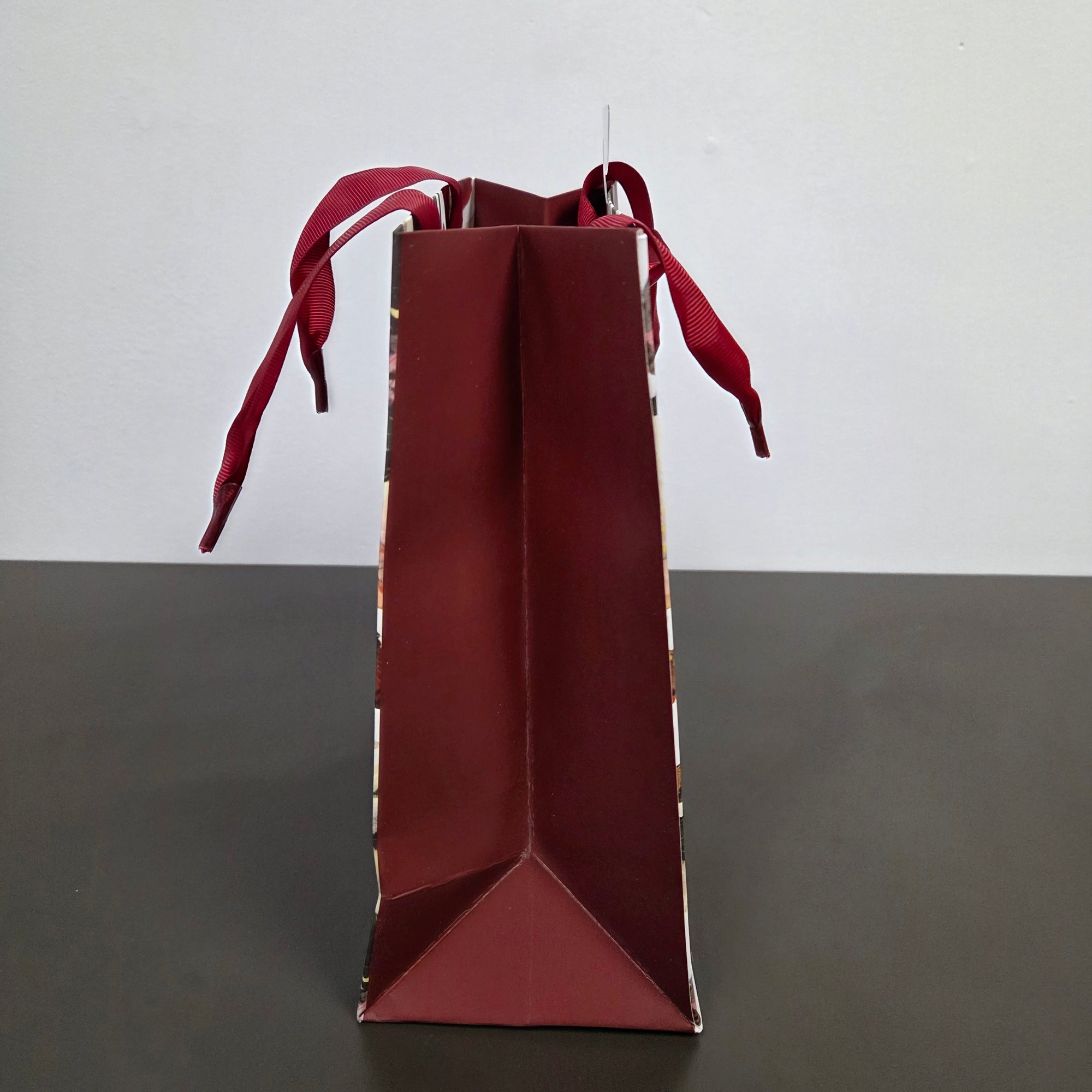 Red gift bag with a ribbon 
