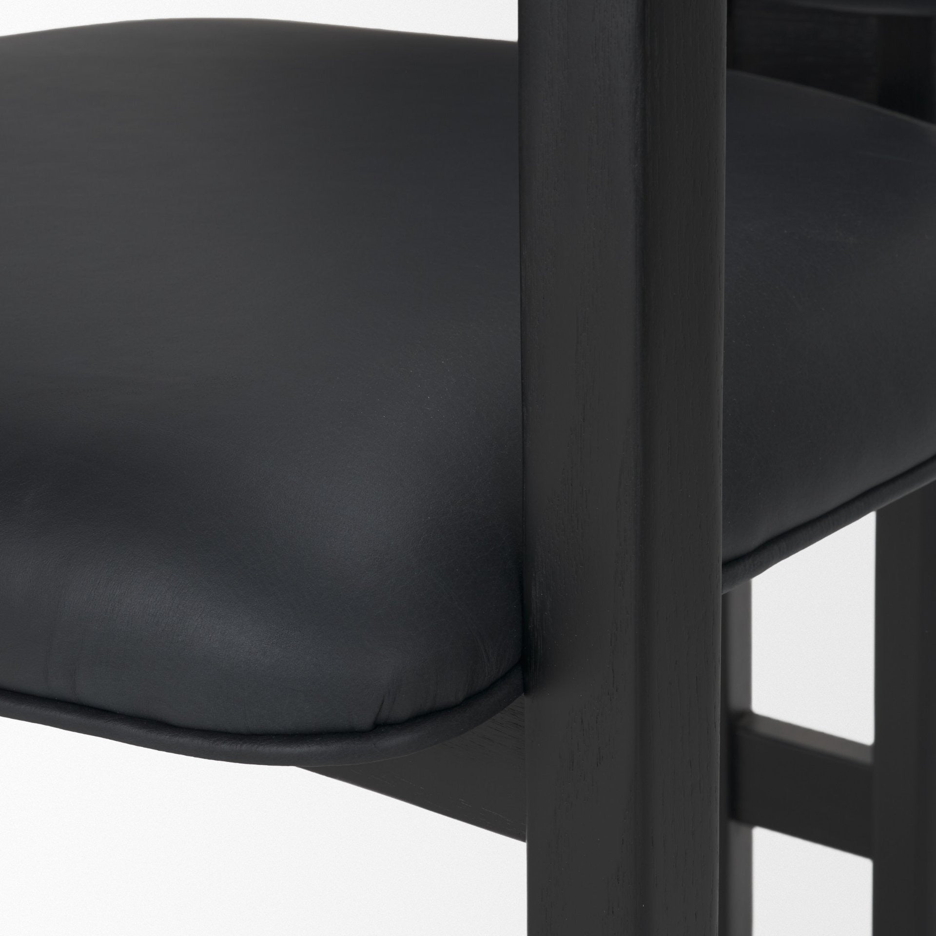 Carlisle Curved Back Black Leather Tripod Frame Dining Armchair - Dekor Butik