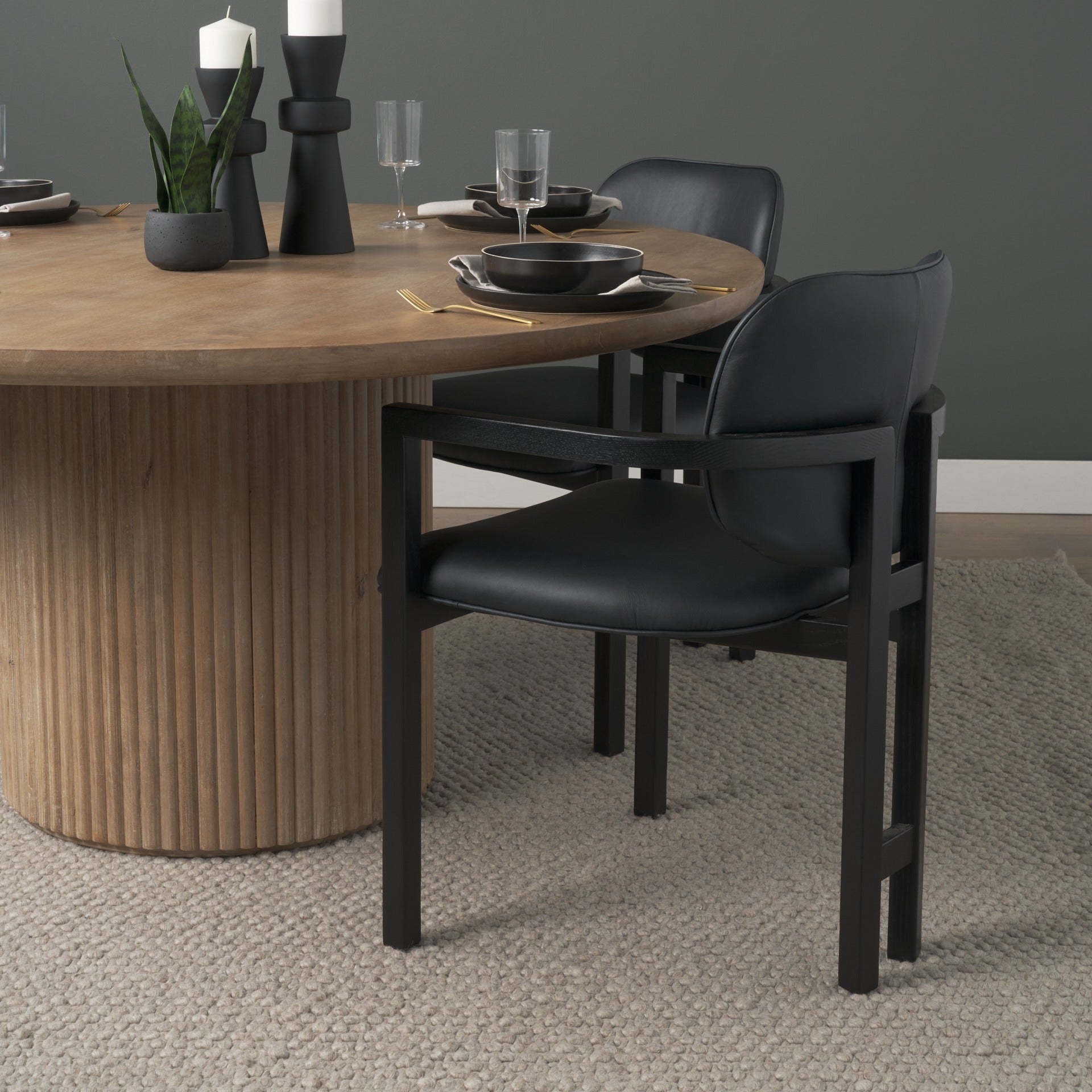Carlisle Curved Back Black Leather Tripod Frame Dining Armchair - Dekor Butik
